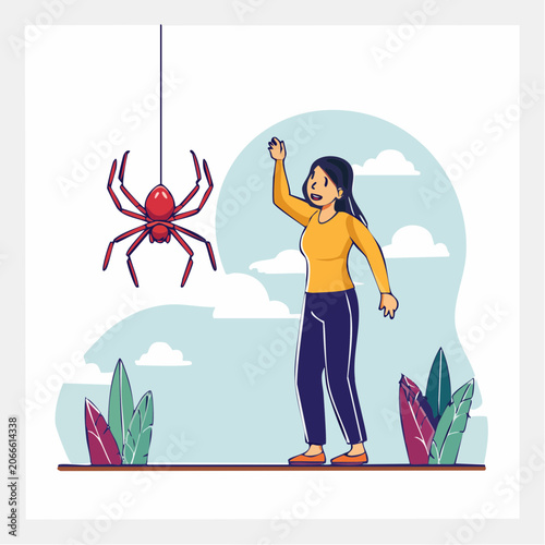 Woman surprised by a hanging spider