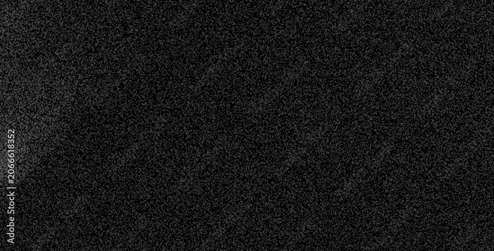 Fototapeta premium a close-up of a dark, grainy, static-filled television screen with digital noise and flickering signals