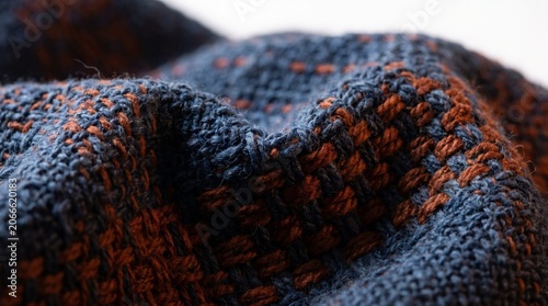 Textile Weaving Action, Fabric Detail, Close-Up Shot, Artistic Display, Soft Lighting, Macro View, Craftsmanship Concept