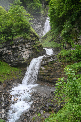 3 stage waterfall cascades down the mountain in Diesbach, Canton of Glarus, Switzerland