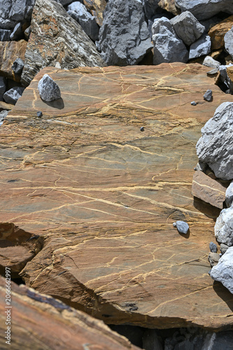 Close-up view of colourful rocks scattered across a scree field near Klausen Pass in the Swiss Alps