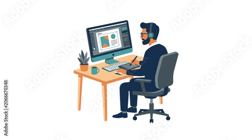 Man working on computer with graphics tablet at desk