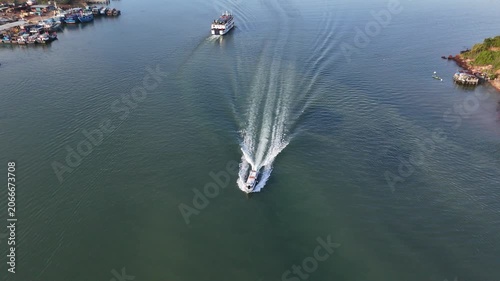 Aerial Shot of Ferry and Speedboat Cruising Near Batam, Indonesia - 4K