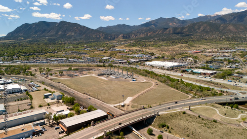 Fotografie Aerial view of Colorado Springs highway overpass bridge and industrial zone with