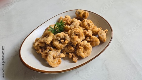 Foto Fried calamary in a plate
