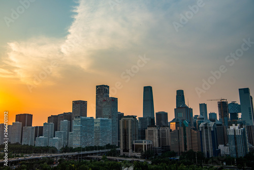 Sunset and blue hour over the Beijing Central Business District skyline featuring the China Zun skyscraper in Beijing, China.