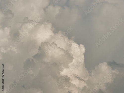 Photos Cumulus clouds, or good weather clouds, appear on sunny days and have a soft, cotton-like appearance with a flat base