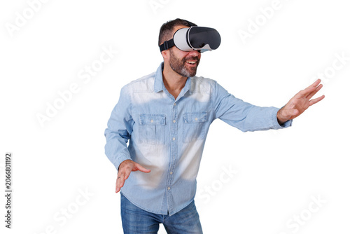 Obraz na płótnie Man wearing a vr headset, immersing himself in a virtual world