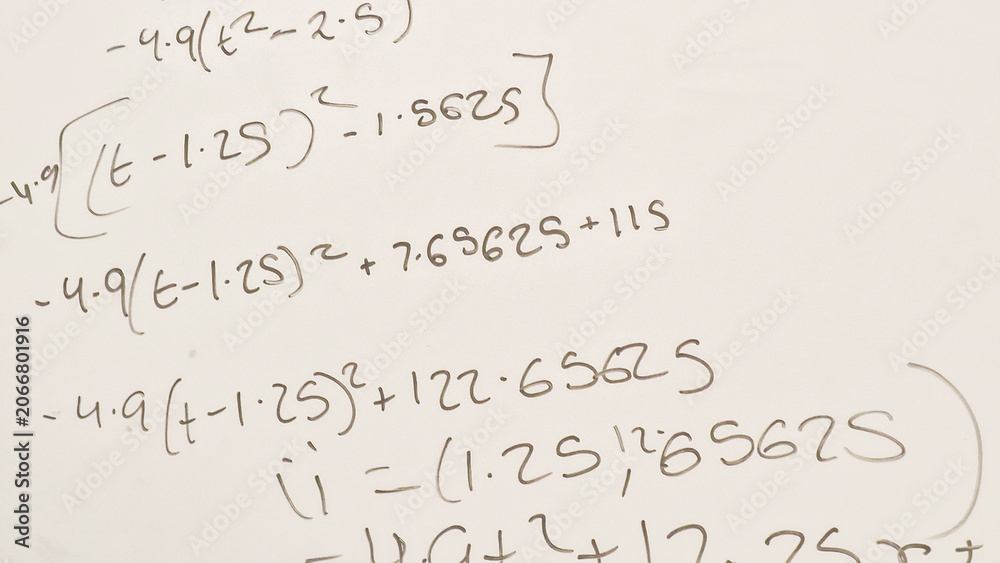 Naklejka premium Close up of maths equations on a whiteboard