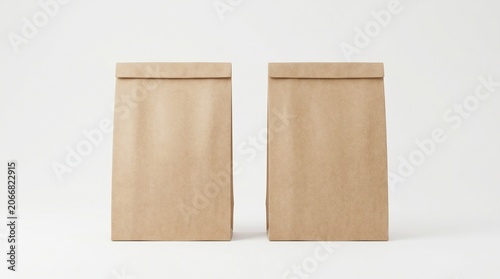 Two brown paper bags isolated on white studio background
