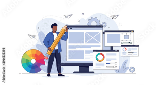 Creative graphic designer uses a giant pencil and color wheel to develop website layouts on a large desktop monitor.