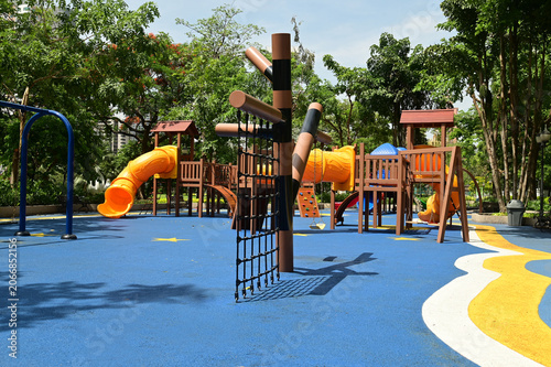 Climbing structures and slides are playground equipment for children, which are part of the public park in Bangkok capital city , Thailand.