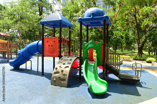 Climbing structures and slides are playground equipment for children, which are part of the public park in Bangkok capital city , Thailand.