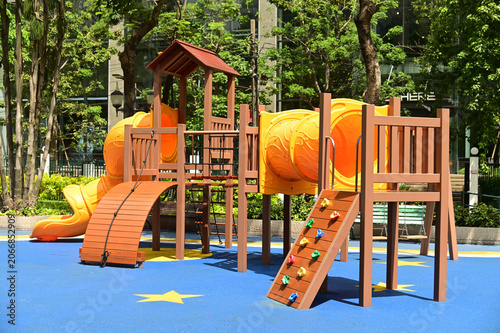 Climbing structures and slides are playground equipment for children, which are part of the public park in Bangkok capital city , Thailand.