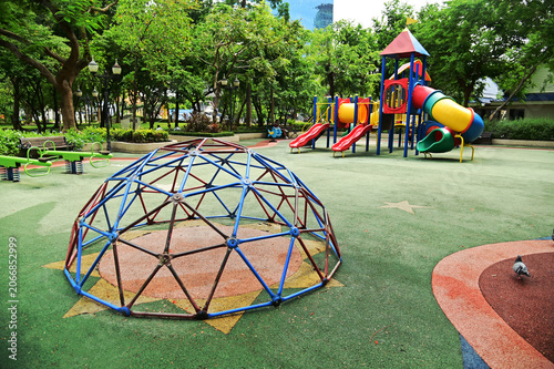 Climbing structures and slides are playground equipment for children, which are part of the public park in Bangkok capital city , Thailand.