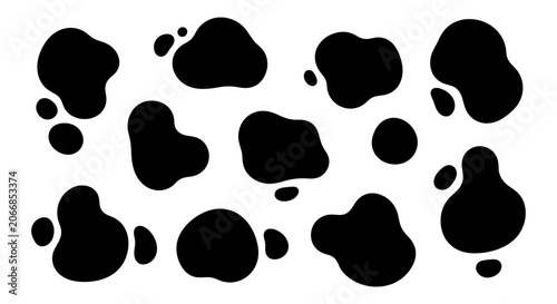Quadro su tela Black cow print pattern with organic spots on a white background.