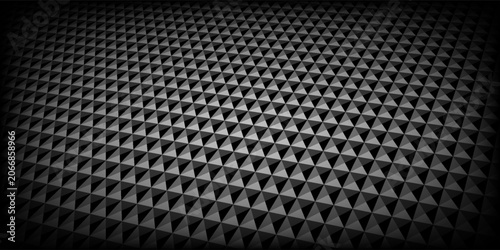 Abstract black carbon metallic pyramid texture background. Carbon fiber seamless pattern style.