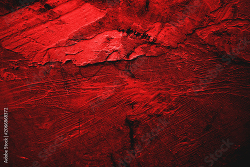 Fotografie Rough red painted texture suitable for bold designs, grunge backgrounds, vivid scarlet themes, abstract projects, and dark surfaces