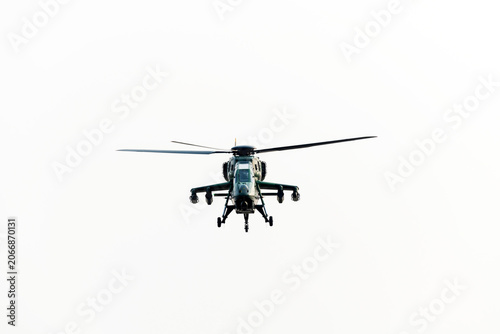 Military helicopter air attack on isolated white background