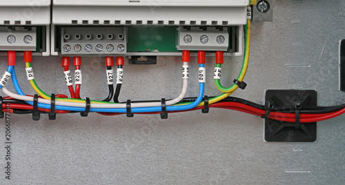 Connecting electrical modules using copper insulated electrical wires in the electrical switchboard. 