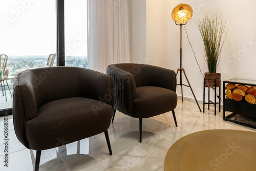 Modern luxury living room interior with panoramic windows