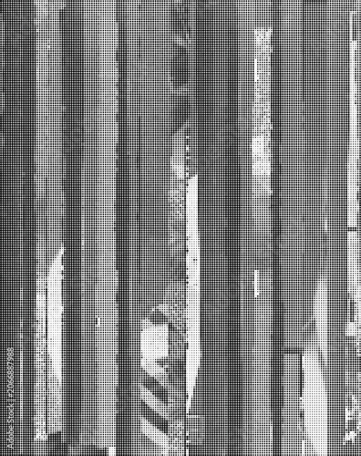 A person walks through a distorted urban scene with striped patterns