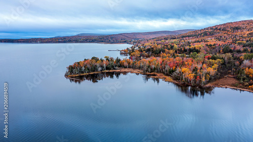 Autumn Coastal Landscape with Colorful Forest and Calm Waters in Nova Scotia, Canada