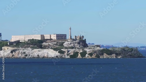 Tableau sur toile Alcatraz island with prison buildings on rocky coast