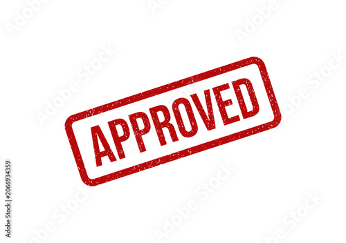 Red approved rubber stamp mark with a grunge texture on the surface