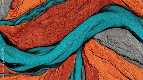 Aerial Abstract of River Delta: A stunning aerial view captures the intricate patterns of a river delta, with flowing water in vibrant turquoise, ochre, and gray hues weaving through the landscape.