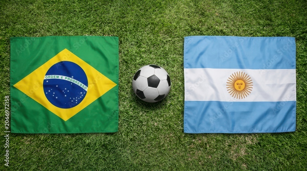 Fototapeta premium Brazil Argentina flags soccer ball green grass field football match championship tournament