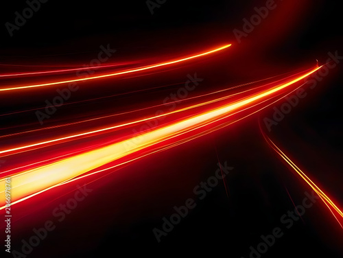 Vibrant red abstract light streaks motion blur.