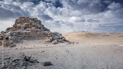 Fotografija Ancient pyramid ruins, Giza desert plateau panorama tourists riding camels on hi