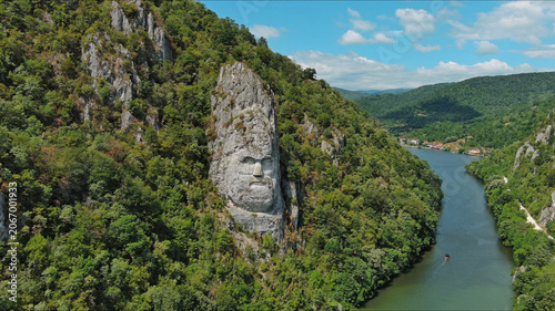 Statue of ancient dacian king Decebal on Danube river