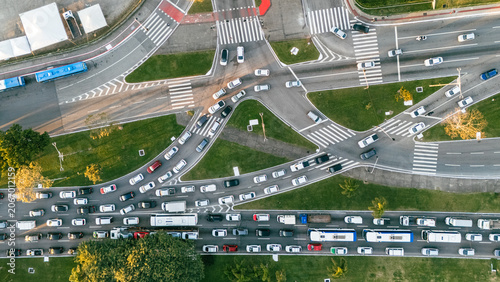 Top Down Aerial View of City Traffic Jam with Multiple Vehicles on Multi-Lane Highway Avenue Street Road