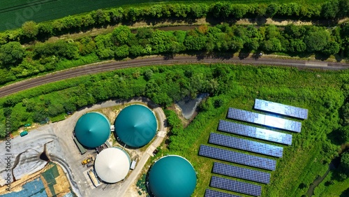 Obraz na plátne Aerial View of Solar Farm and Biogas Domes Next to Railway Germany