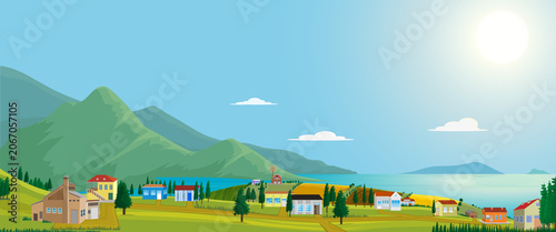 A view of a modern seaside village with a windmill inside.