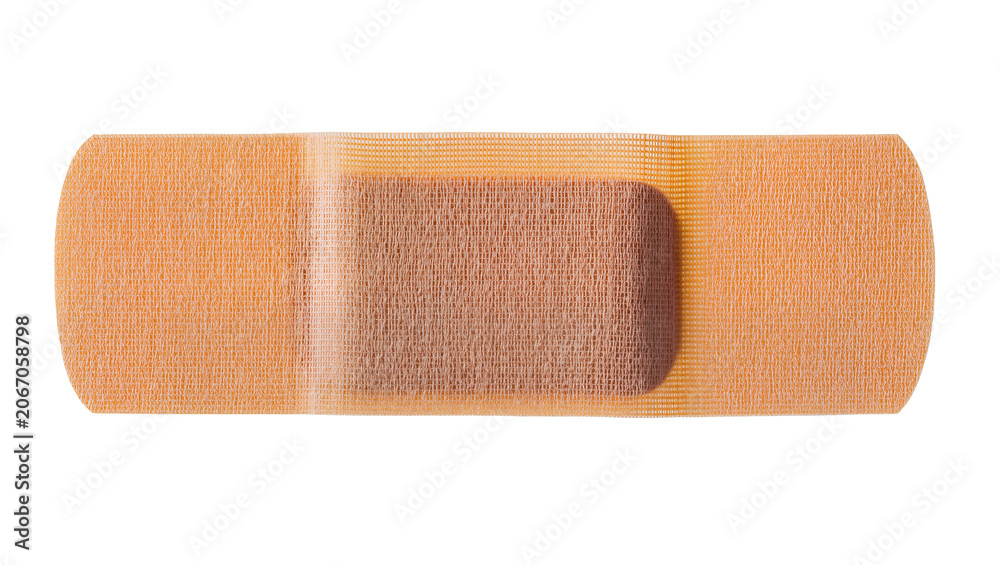 Obraz premium Isolated flexible beige adhesive bandage for minor cuts and scrapes, essential first aid