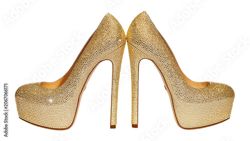 Isolated dazzling golden crystal platform high heels, sparkling elegant women's footwear