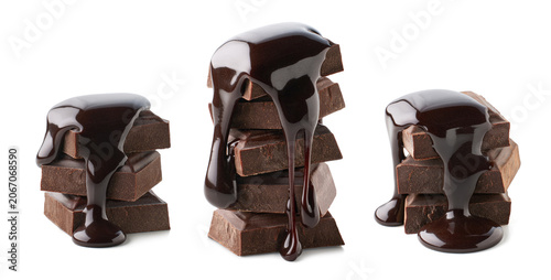 Three stacks of chocolate pieces with melted chocolate pouring over them