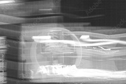 Halftone overlay with horizontal motion blur over architectural elements on transparent background. Dynamic streaked texture, multiply blend mode ready.