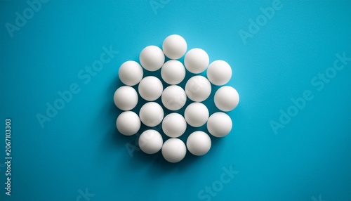 White D Spheres Clustered On Light Blue Background