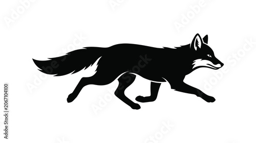 Tableau sur toile Running fox silhouette leaping forward in profile