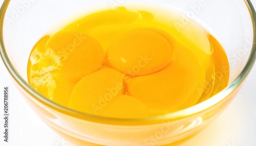 Fresh sliced peaches in glass bowl.