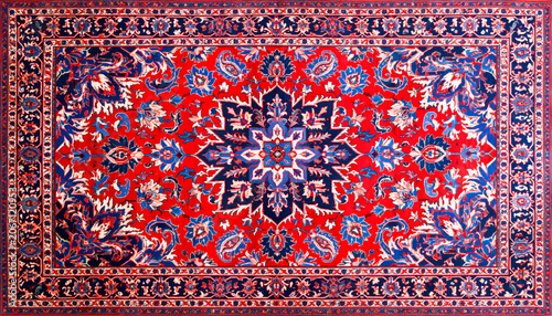 Intricate persian carpet red blue floral medallion pattern