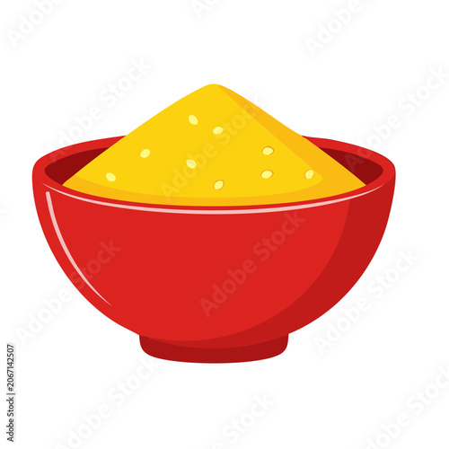 Red bowl filled with yellow turmeric powder