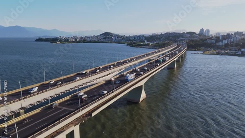 Aerial View of Pedro Ivo Campos and Colombo Salles Bridges with City Traffic and Ocean Coastline in Florianopolis Santa Catarina Brazil