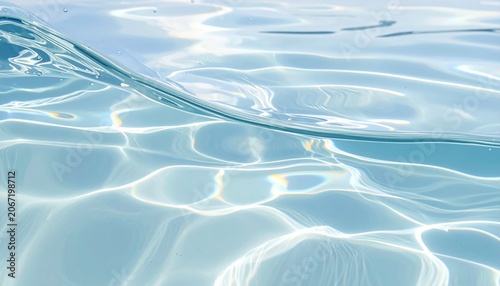 Rippling clean water surface with light reflection