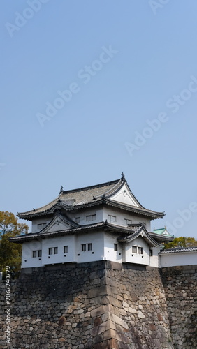 Iconic Japanese Castle Guardhouse with Traditional Roof on Robust Stone Wall