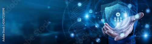 Expert pro hand-holds ENTERPRISE RESOURCE PLANNING global network. Manager working on laptop integrating business data and workflows. Efficient resource control and corporate management.